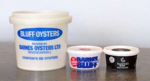 The new-look black and gold Barnes Wild Bluff Oysters pottle (right) alongside the old pottles, which have been in the market for the past 18 years.