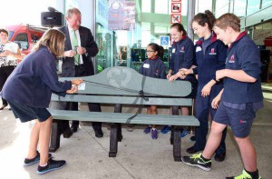 Hon Dr Nick Smith and Blockhouse Bay Junior School – with the recycled plastic bench Dr Smith presented to the school. Photo Credit ©Michael Bradley.