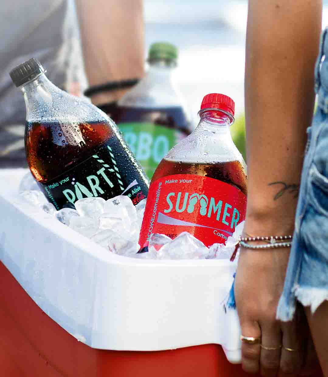 Coca-Cola bottle celebrates 100 years and changes colours for summer