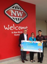 Winner Mary Flego with Merih Boz, New World Banner Manager, Foodstuffs North Island (left), and Harry Chawla, Owner New World Kumeu (right).