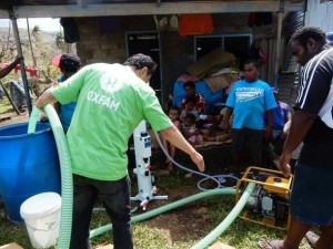 Oxfam Australia's Water, Sanitation and Hygiene Coordinator Praphulla Shrestha sets up a Sky Hydrant, to provide clean water, in the aftermath of Tropical Cyclone Winston. Oxfam water filtering equipment that will be vital in preventing the spread of waterborne disease in the weeks following Severe Tropical Cyclone Winston has arrived on the ground in Fiji, as Oxfam steps up its response.