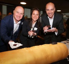 Graham Rogers, Laura Grufus and Paul Holland – BIC Oceania Staff with the 1.6-metre BIC CLIC replica cake. 