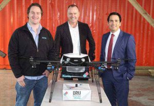Matt Sweeny, Flirtey CEO; Don Meij, Domino’s Group CEO & Managing Director and Minister Simon Bridges, Minister of Transport with the new Dru Drone.