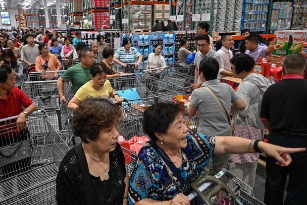 Crowds flood Costco at opening in China