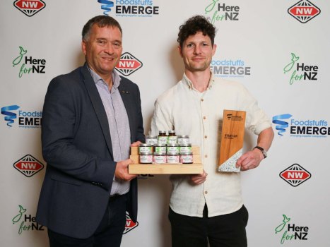 Foodstuffs North Island CE Chris Quin with Adam McConnochie and the award-winning Solid Toothpaste.